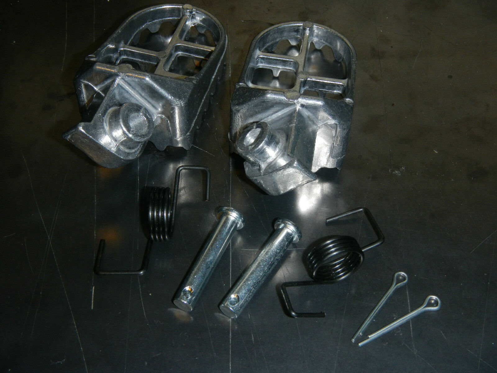 AFTERMARKET FOOT PEG SET HONDA 2003-2005 CRF110F 2014-15 CRF125F, 14-15 CRF125FB - Fresh Stock Dated October 2025