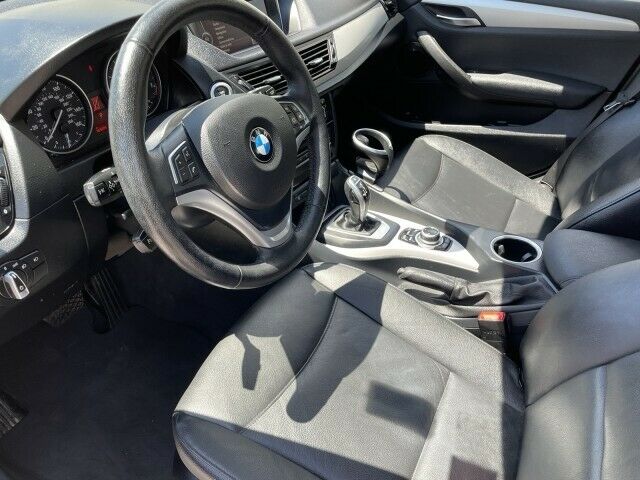 2013 BMW X1 xDrive28i~ ONLY 55K MILES~ CLEAN CARFAX~ 2.0 TURBO 2013 BMW X1, Black Sapphire Metallic with 55259 Miles available now! - Fresh Stock Dated October 2025