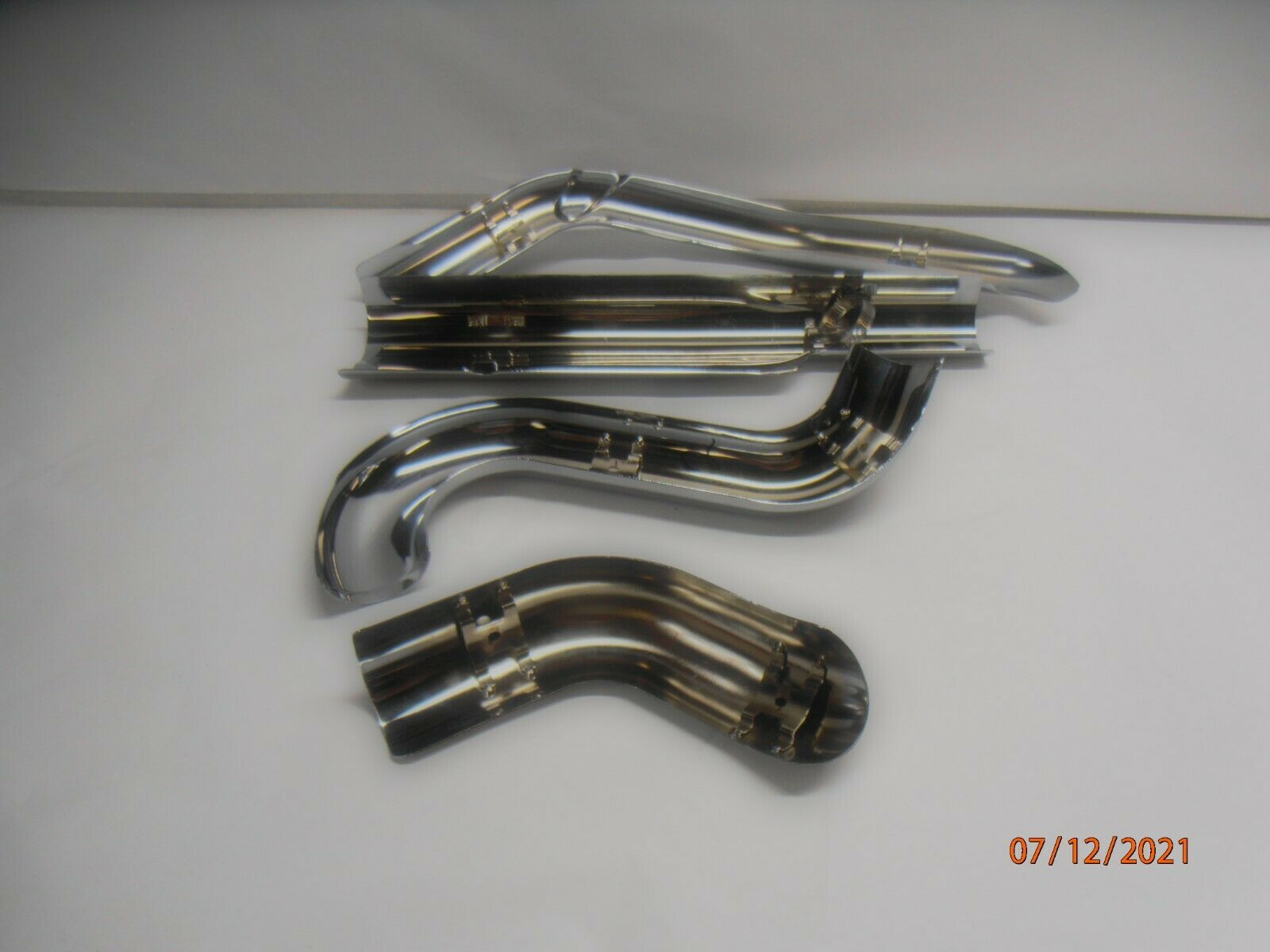 Harley-Davidson Touring OEM Chrome Exhaust Heat Shields 2009-2016 P/N 65634-09 - Fresh Stock Dated October 2025