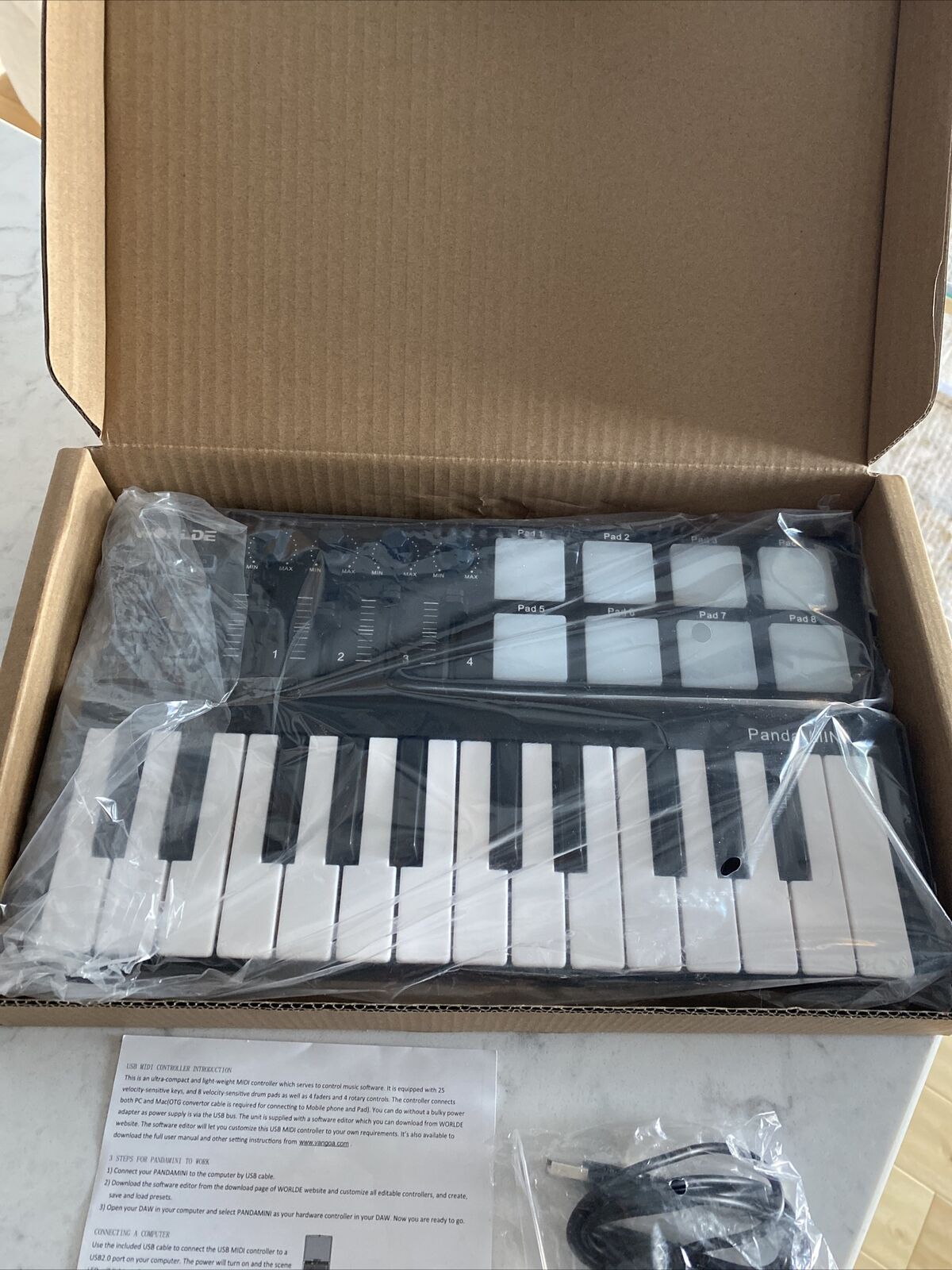 Worlde Panda Mini 25-Key Portable USB Keyboard Drum Pad MIDI electric Controller - Fresh Stock Dated October 2025