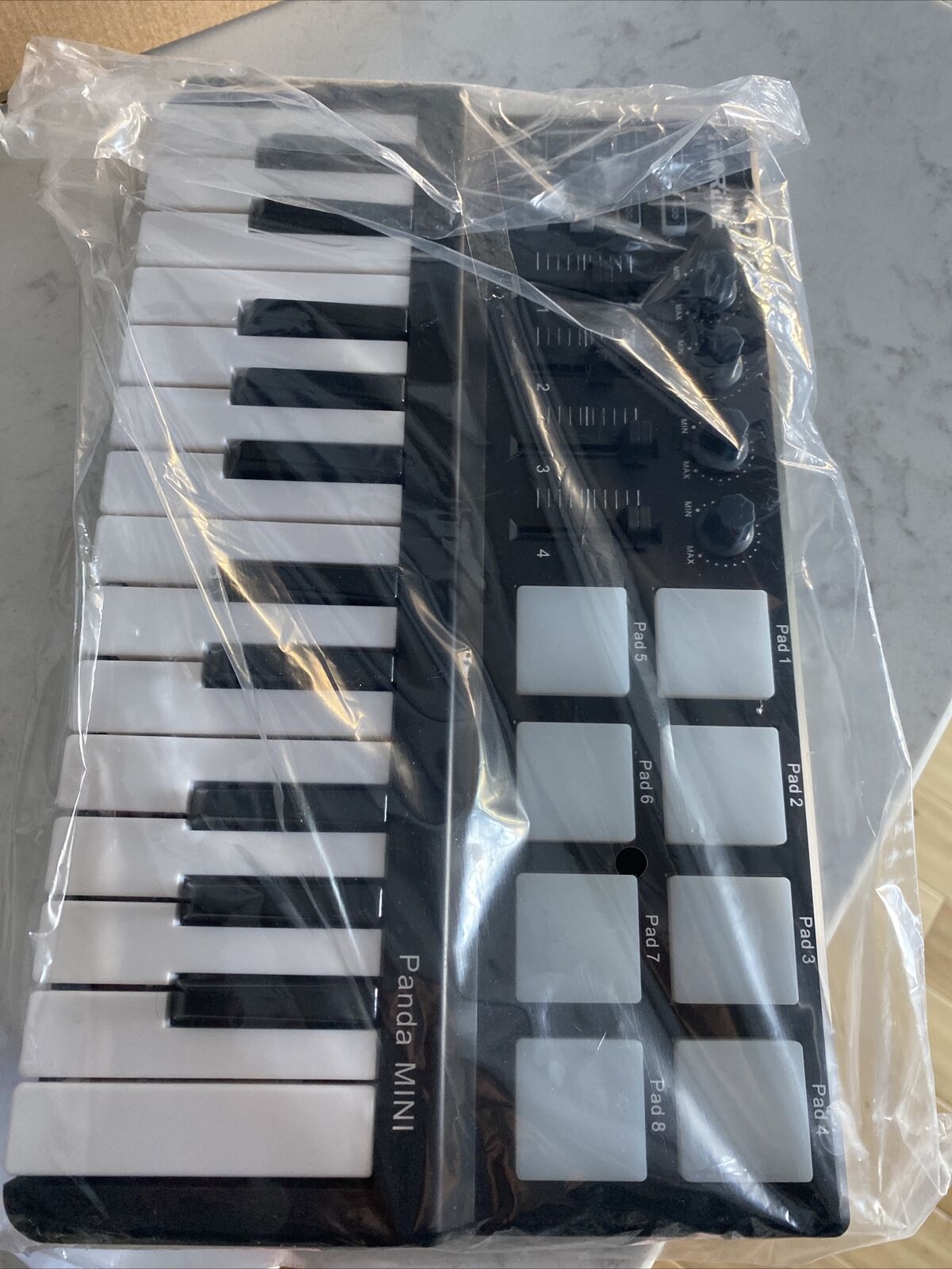 Worlde Panda Mini 25-Key Portable USB Keyboard Drum Pad MIDI electric Controller - Fresh Stock Dated October 2025