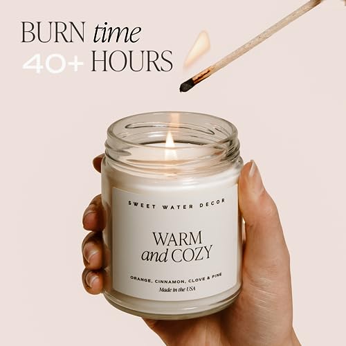 Sweet Water Decor Warm and Cozy Candle | Pine, Orange, Cinnamon, and Fir Winter Scented Soy Candles Fall Candle for Home | 9oz Clear Jar with Gold Foil Made in the USA