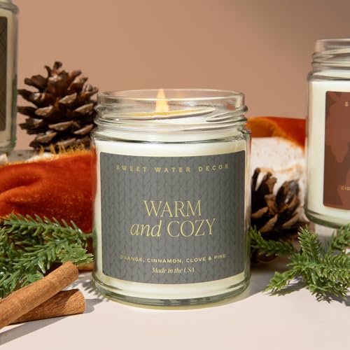 Sweet Water Decor Warm and Cozy Candle | Pine, Orange, Cinnamon, and Fir Winter Scented Soy Candles Fall Candle for Home | 9oz Clear Jar with Gold Foil Made in the USA