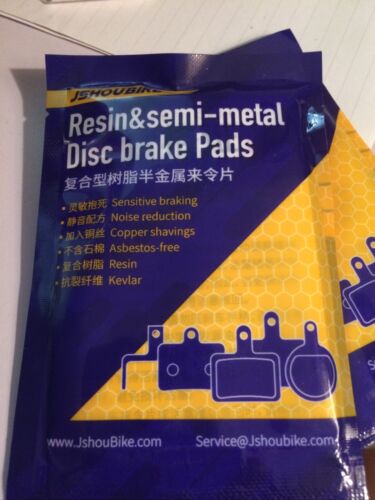 2PCS Black JSH Bicycle Resin Disc Brake Pads for Mountain Bikes New Open Pack - Fresh Stock Dated October 2025