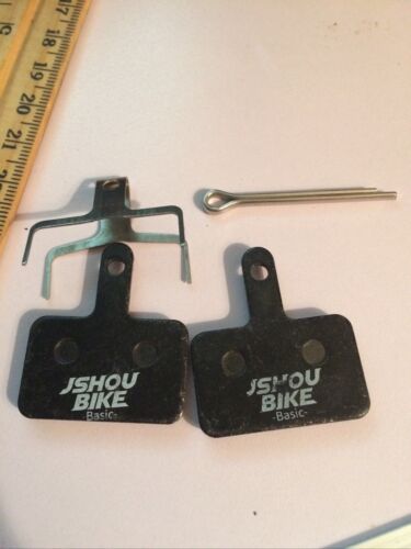 2PCS Black JSH Bicycle Resin Disc Brake Pads for Mountain Bikes New Open Pack - Fresh Stock Dated October 2025