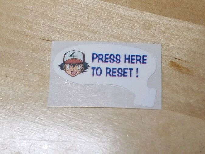 1 (ONE) Toys R Us N64 Nintendo 64 Special Pikachu Edition *RESET STICKER ONLY* - Fresh Stock Dated October 2025